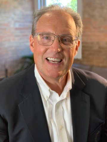 elderly businessman smiling